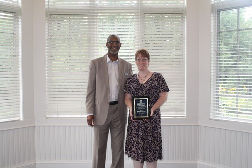 Dean Grant with award recipient, Jennifer McCaul